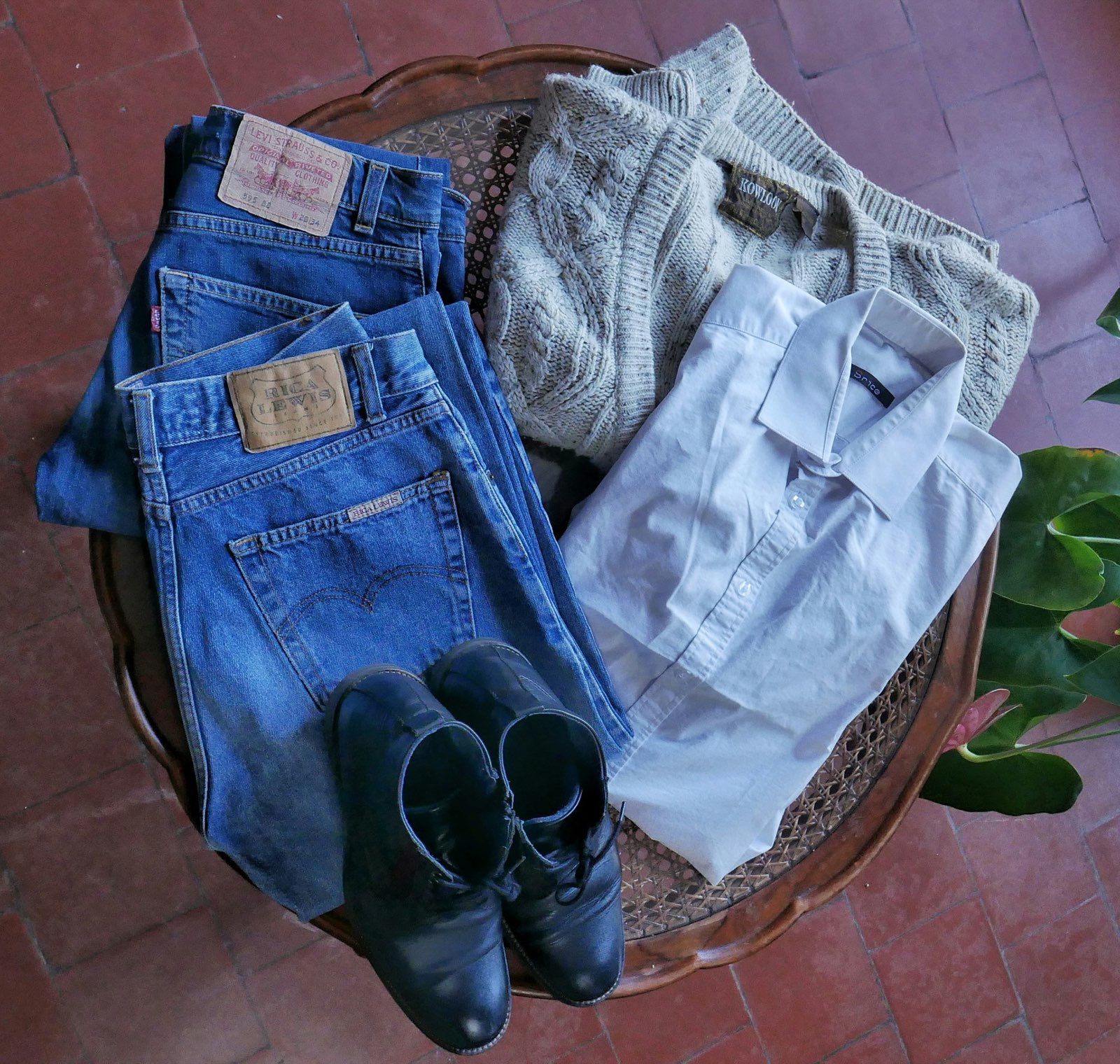 Denim flat-lay retouch — weave and wash preserved, color true to the garment