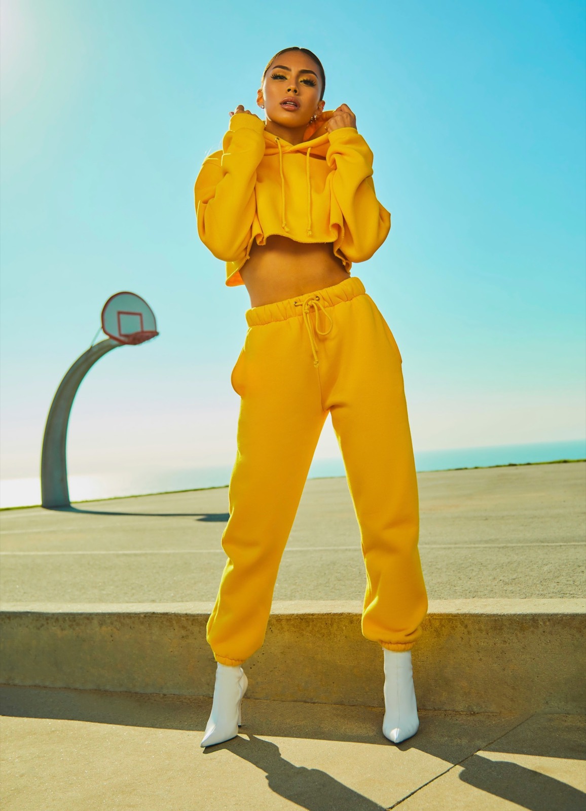 On-model apparel retouch — garment and background refined, true color preserved