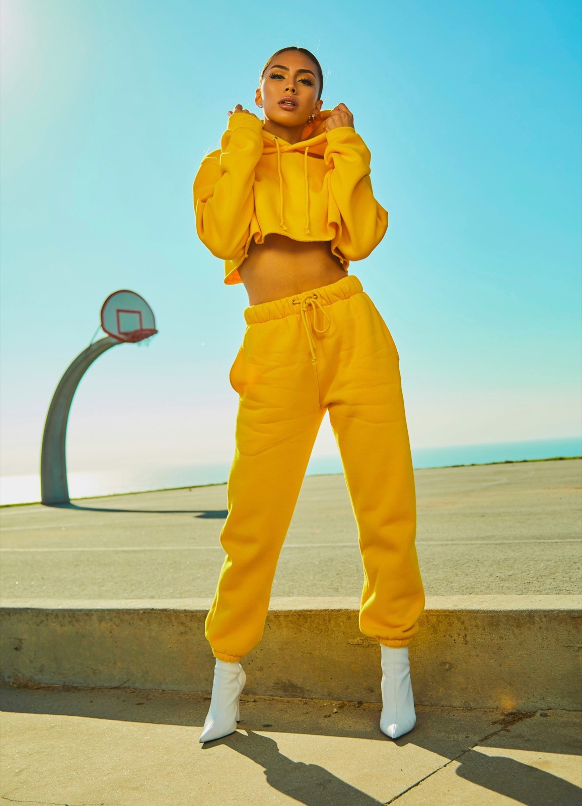 On-model apparel retouch — garment and background refined, true color preserved